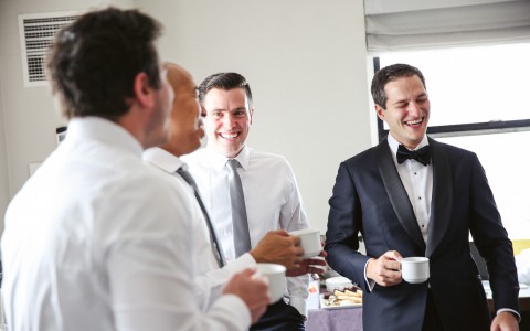 groom and groomsmen celebrating