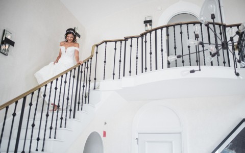 bride descending the stairwell
