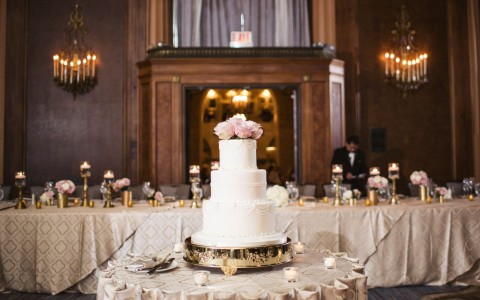 large gathering space with a wedding cake