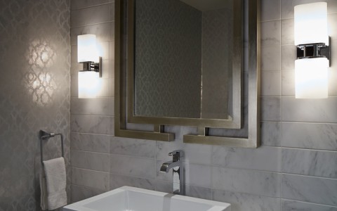nice bathroom with fancy lights and mirror