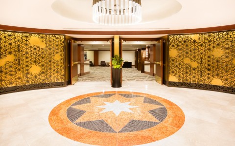 large circular lobby with a nice chandelier