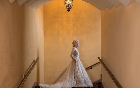 bride posing in a stairwell
