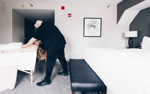 guest getting a massage in their room