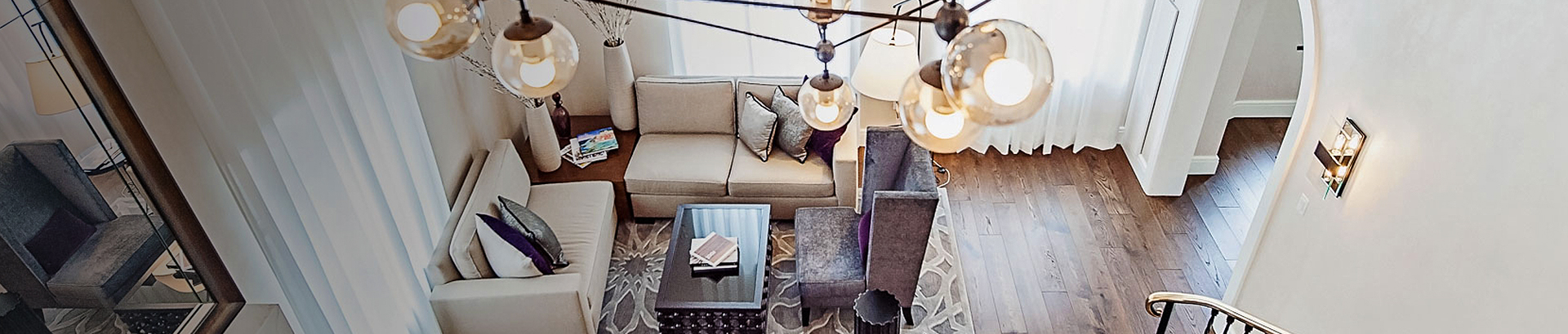 room with couches and arm chairs