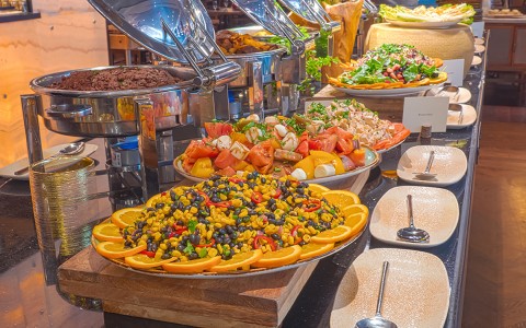 a buffet of food laid out in the inercontinental miami 
