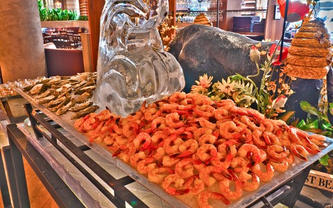 a shrimp buffet with an ice sculptor. 