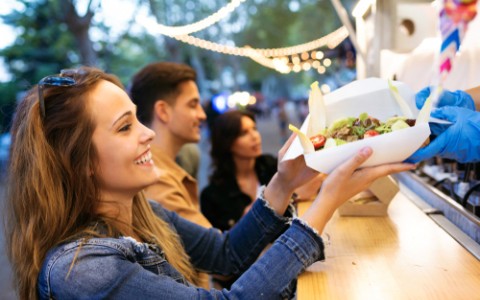 friends at food truck window
