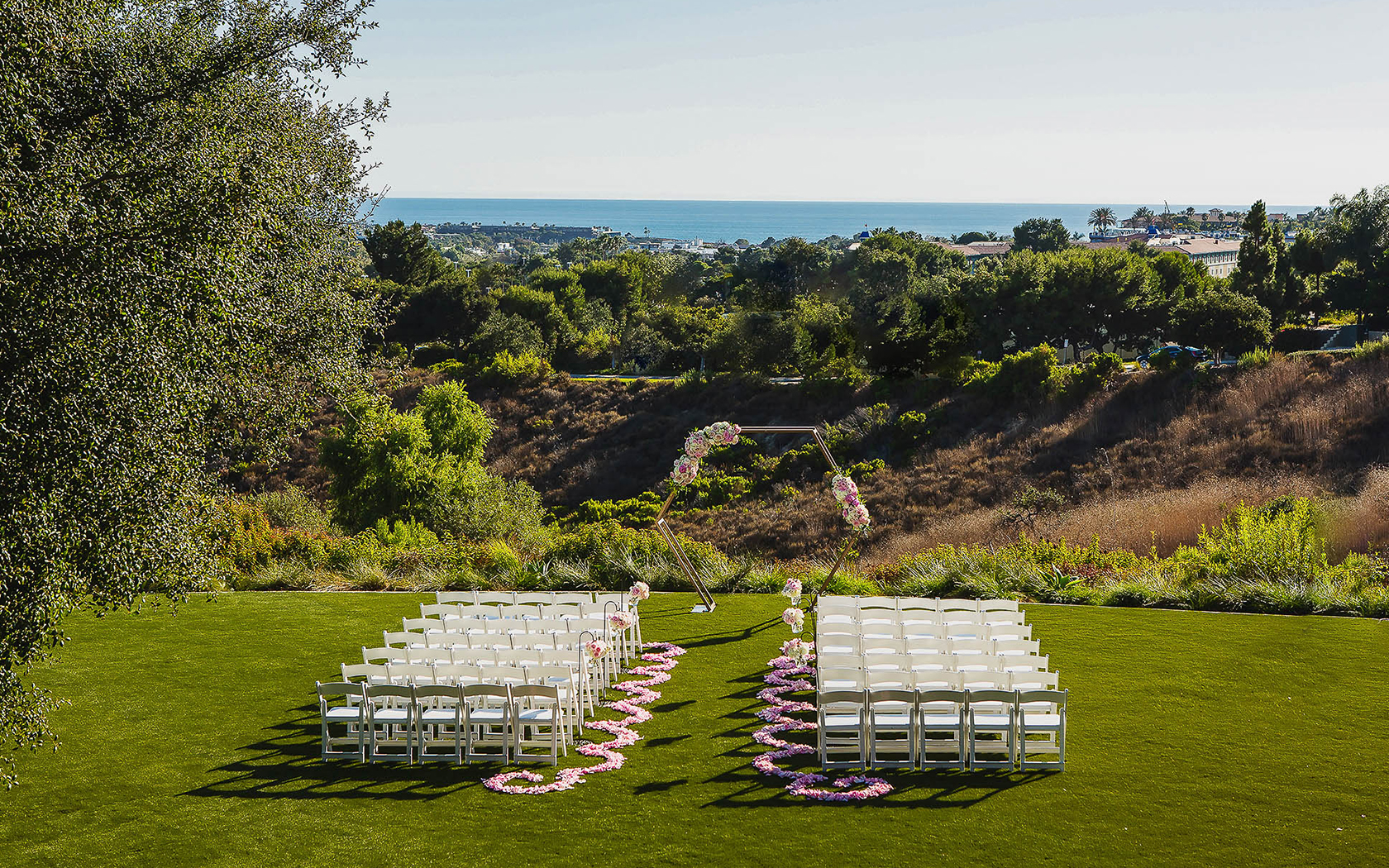aerial view of the wedding ceremony set up on the golf course