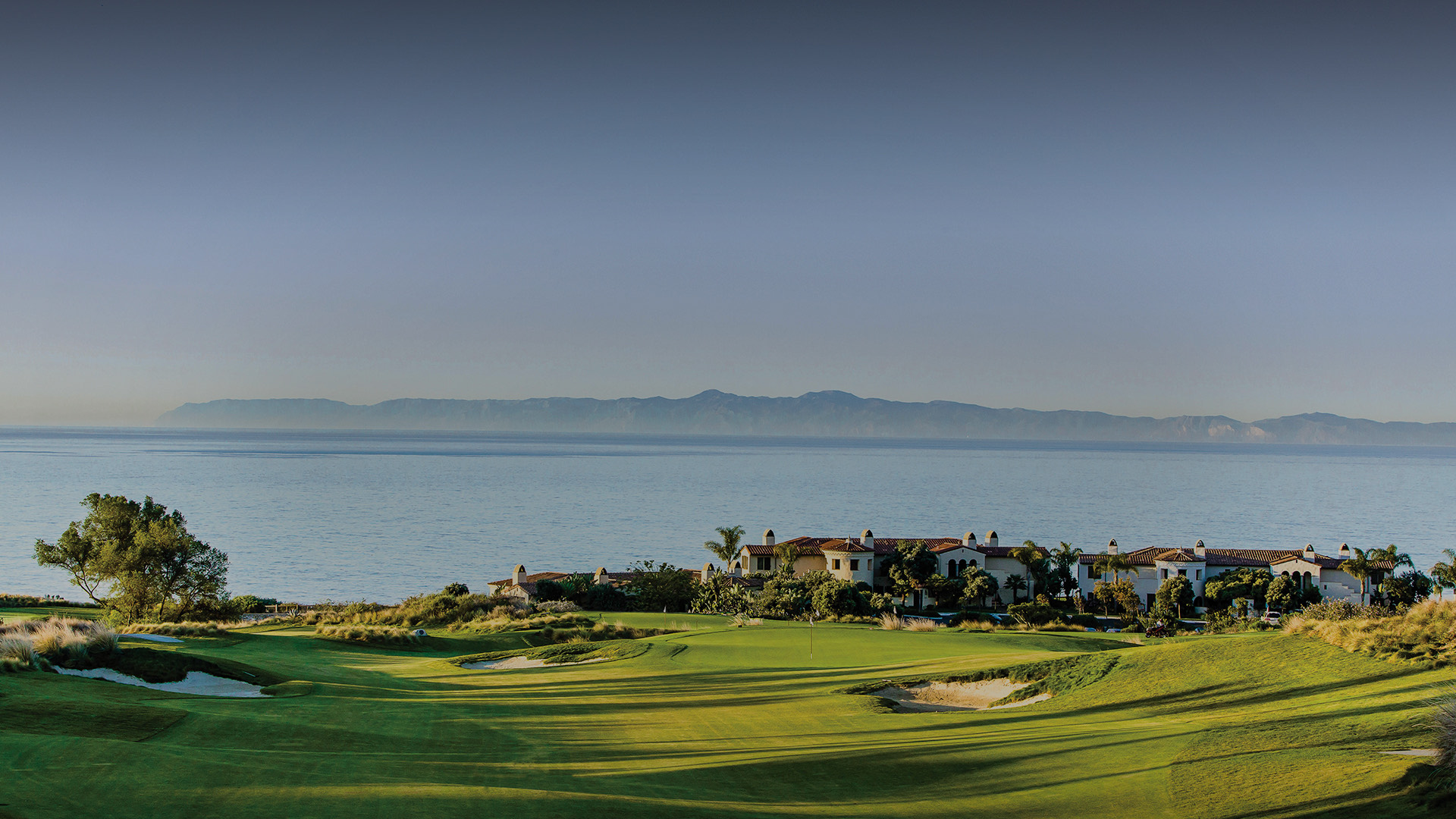 Lovely golf course overlooking a calm ocean