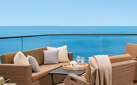 Stunning view of the ocean off of a balcony at Surf & Sand