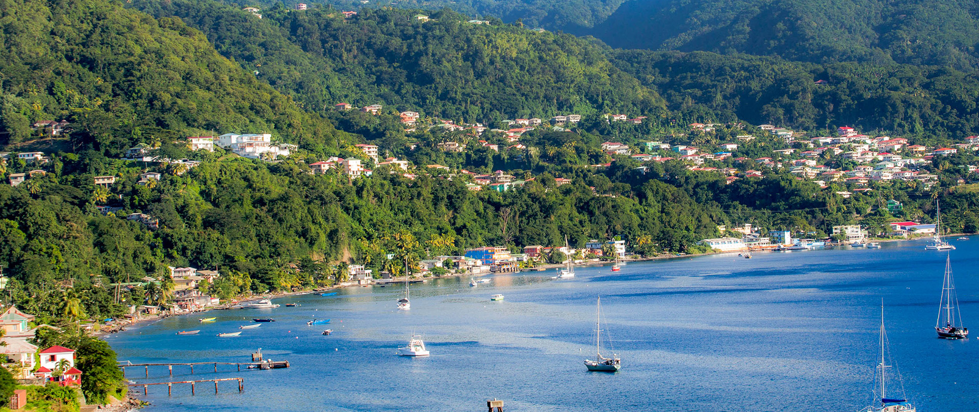 birds eye view of bay area with sail boats