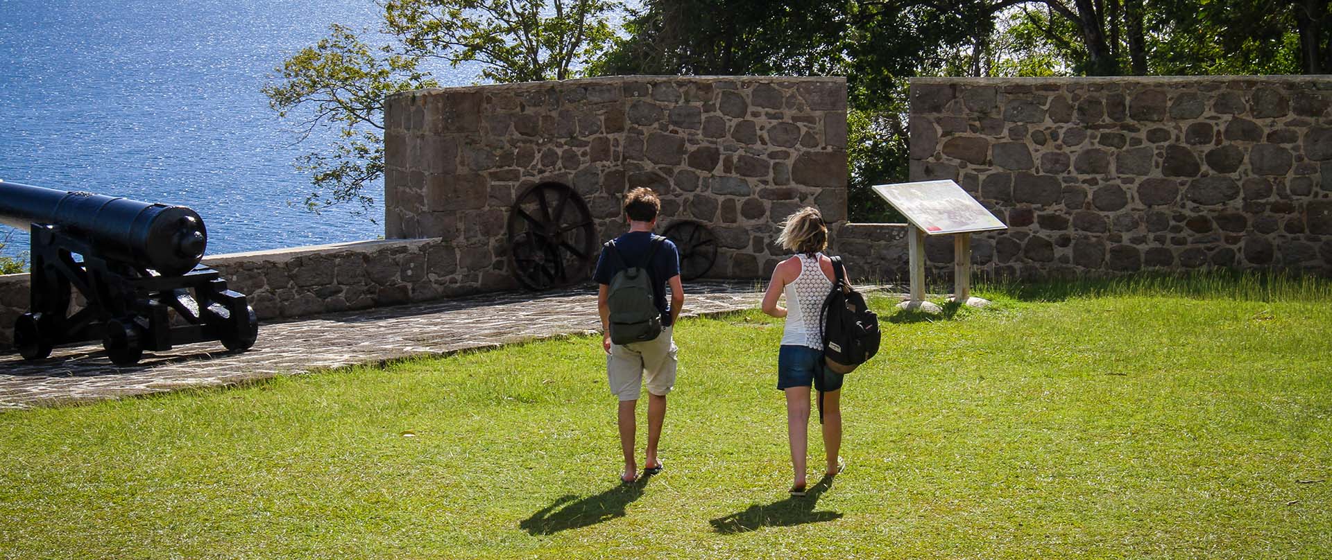 two people waking around on lawn