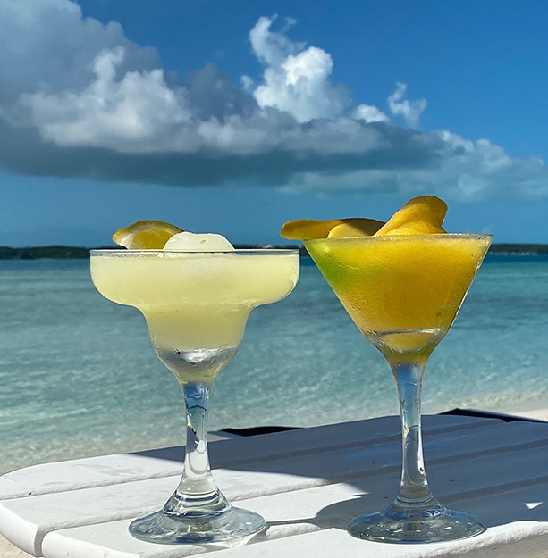 two frozen drinks in glasses