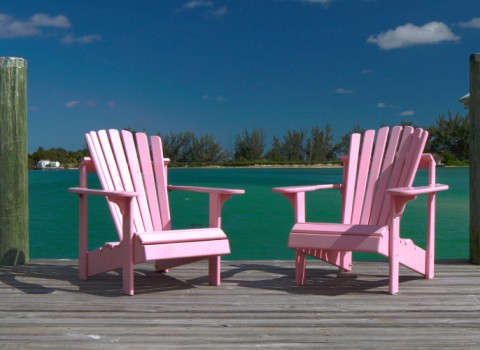 pink chairs sunset beach