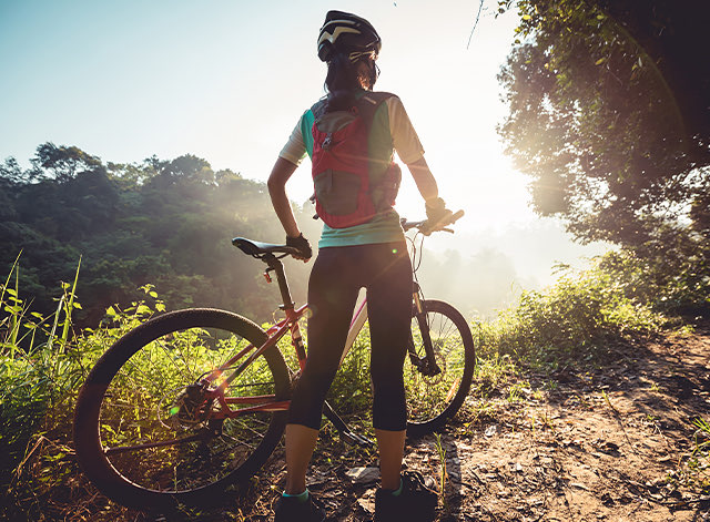 A woman bike riding