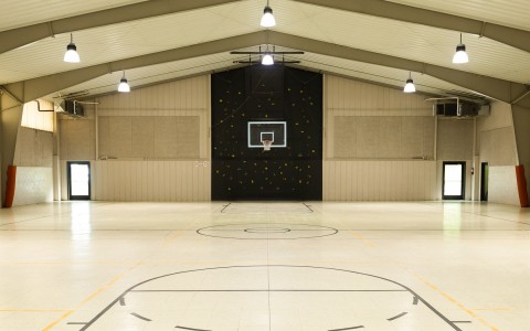 indoor basketball court of property 