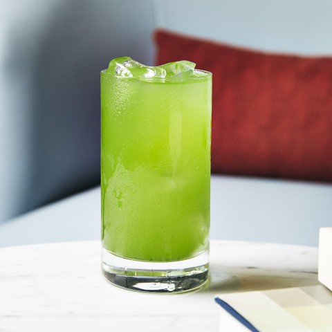 tall glass with green drink