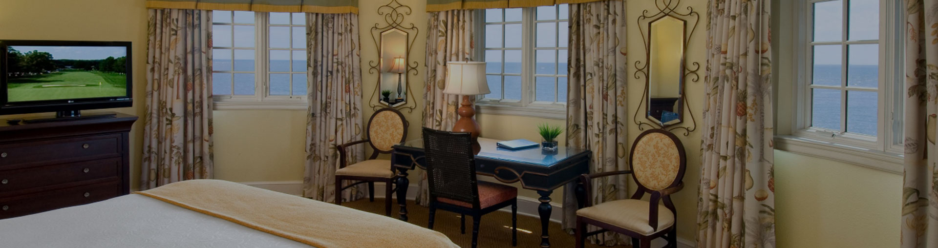 view from the bed in accommodation option large windows view of ocean