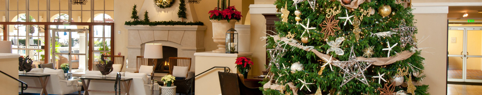 christmas tree with seashell decorations in lobby