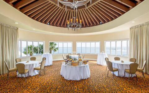 Internal view of a big elegant venue with sea view