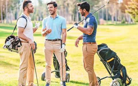 View of a group of men playing golf
