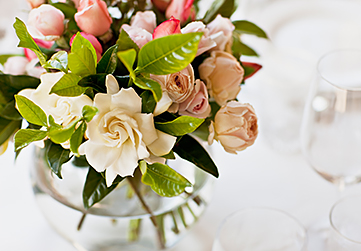 closeup view of a boutique of roses in the center of a table