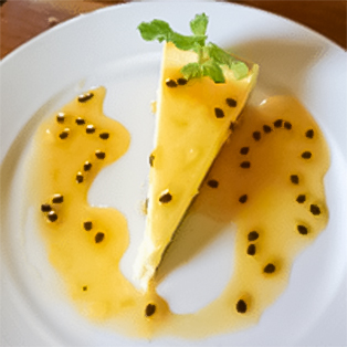 Cheesecake with a passion fruit sauce over it