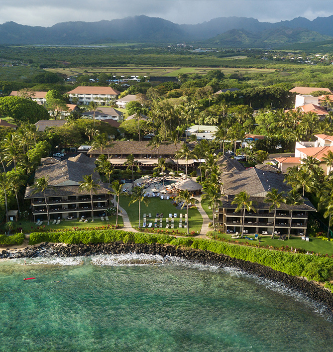 aerial view of the resort and the ocean on a sunny day