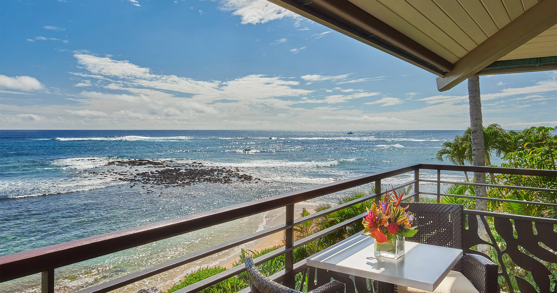 view of the ocean from a bedrooms balcony
