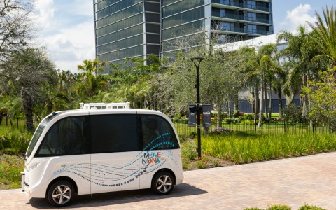 transportation shuttle in front of wave hotel