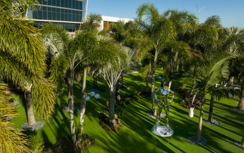 lake nona wave hotel drone view of sculptures in garden