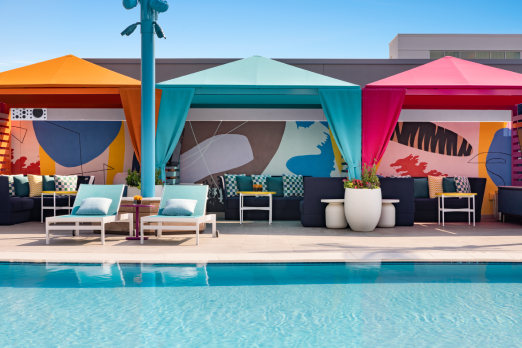 haven pool with colorful tents