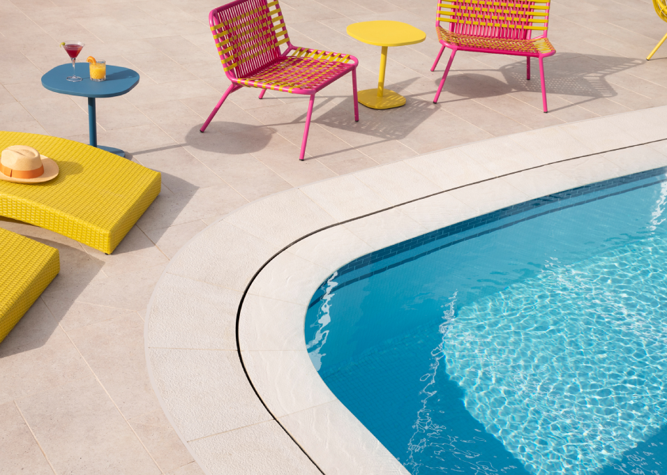 haven pool with colorful chairs