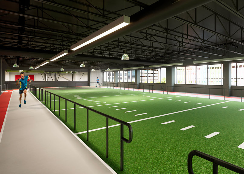 lake nona performance center indoor area with turf and a track