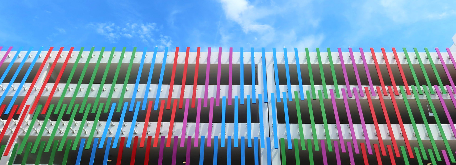 lake nona wave hotel exterior with colored panels