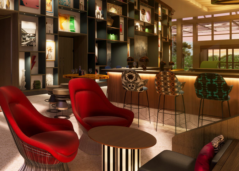 interior of living room bar with two red chairs and decorative bar chairs behind 