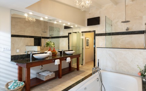 Hotel bathroom with jacuzzi tub and double sinks