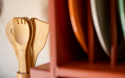 a view to the kitchen with wooden cutlery 