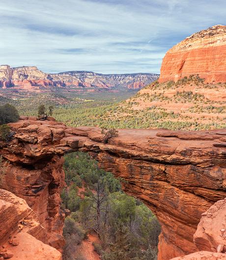 View of two big red mountains and lots of trees