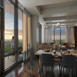 view of the dining and living room area looking out onto the balcony through the large window