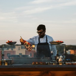 chefs preparing food on the rooftop