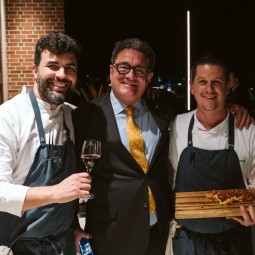 chefs posing for a picture with the master sommelier
