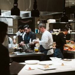 picture of the chefs cooking in the kitchen