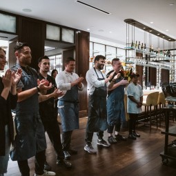 the chefs and team clapping at the end of the event