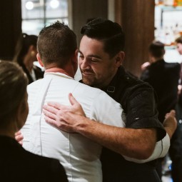 chefs hugging