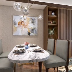marble dining table with a modern lamp hanging above and wooden furniture and decor around the room