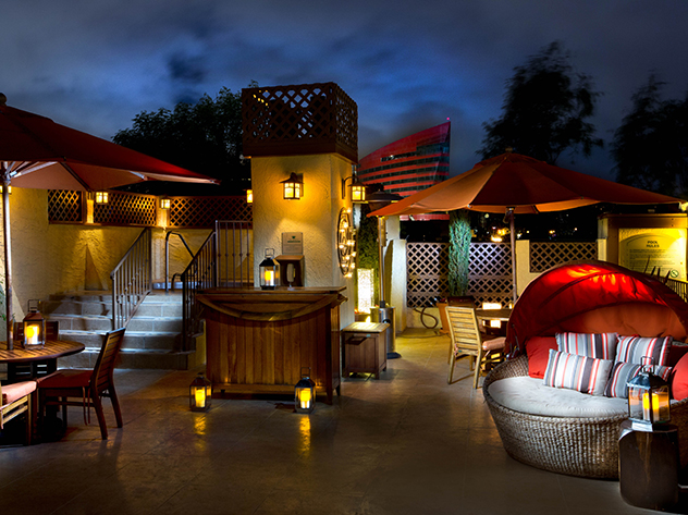 evening on the rooftop lit with lanterns