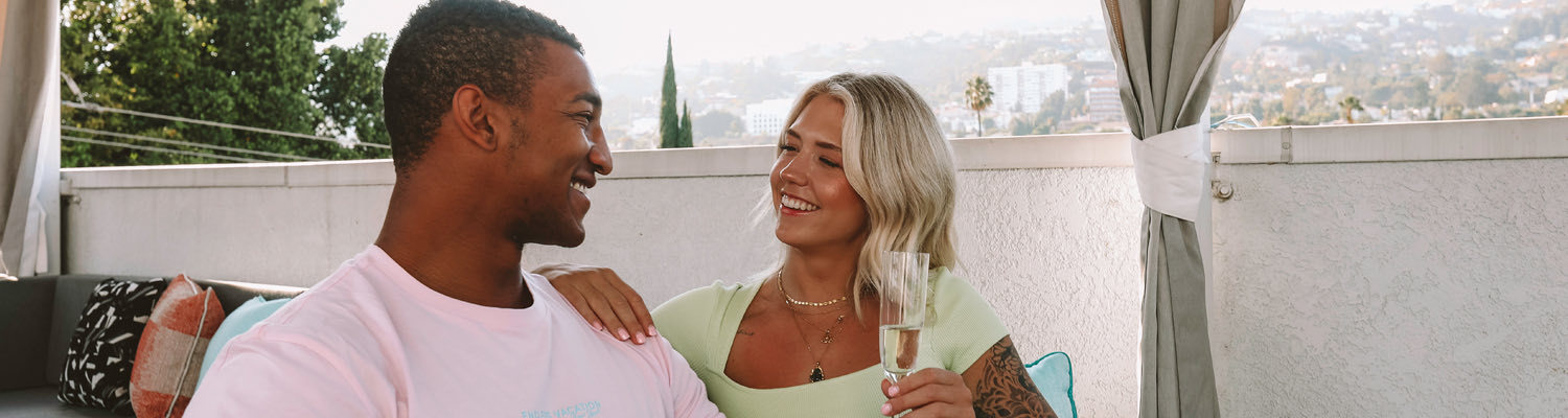 Couple enjoying champagne outdoors