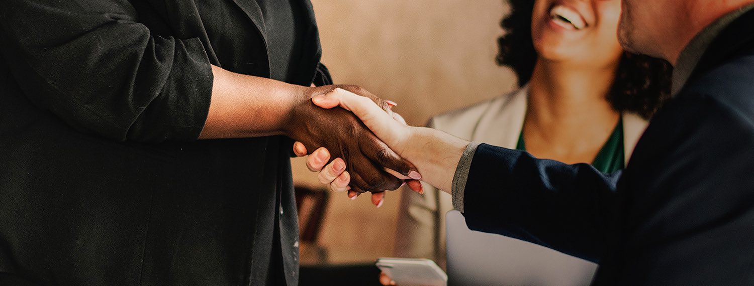 Close up of two people shaking hands
