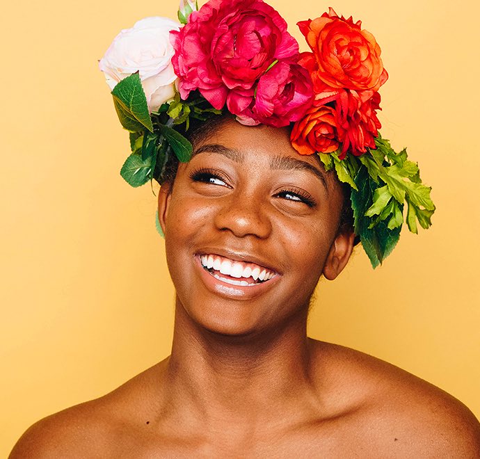 Woman with colorful flower headpiece